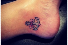 pretty-small-bow-n-anchor-tattoo-on-heel