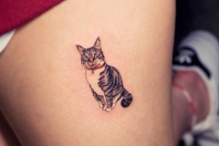 Cute-Small-Cat-Tattoo-On-Girls-Thigh