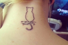 small outline cat tattoo