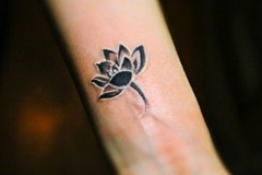 Very-Cute-Small-Flower-Tattoo-Idea