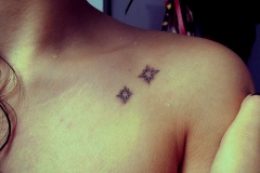 Star-Tattoo-for-Women-on-Upper-Piece-of-Chest